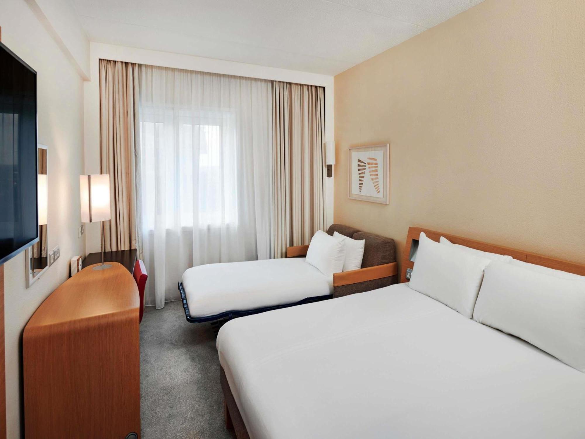 Executive Zimmer mit Queensize-Bett und Sofa